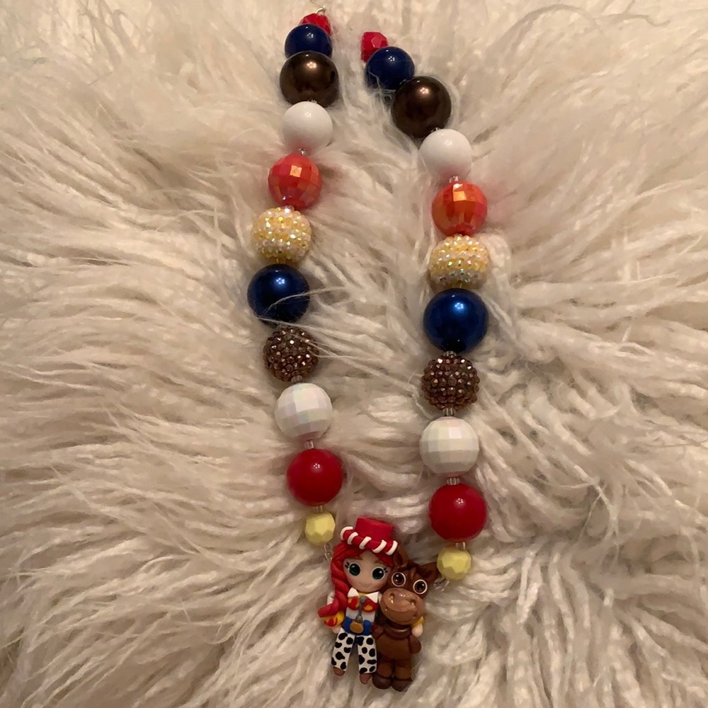 Jessie and Bullseye hand crafted necklace! NWOT